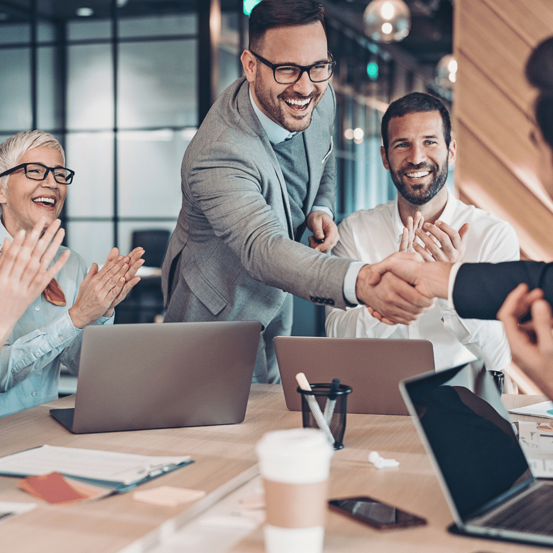 Client shaking hands with advisor